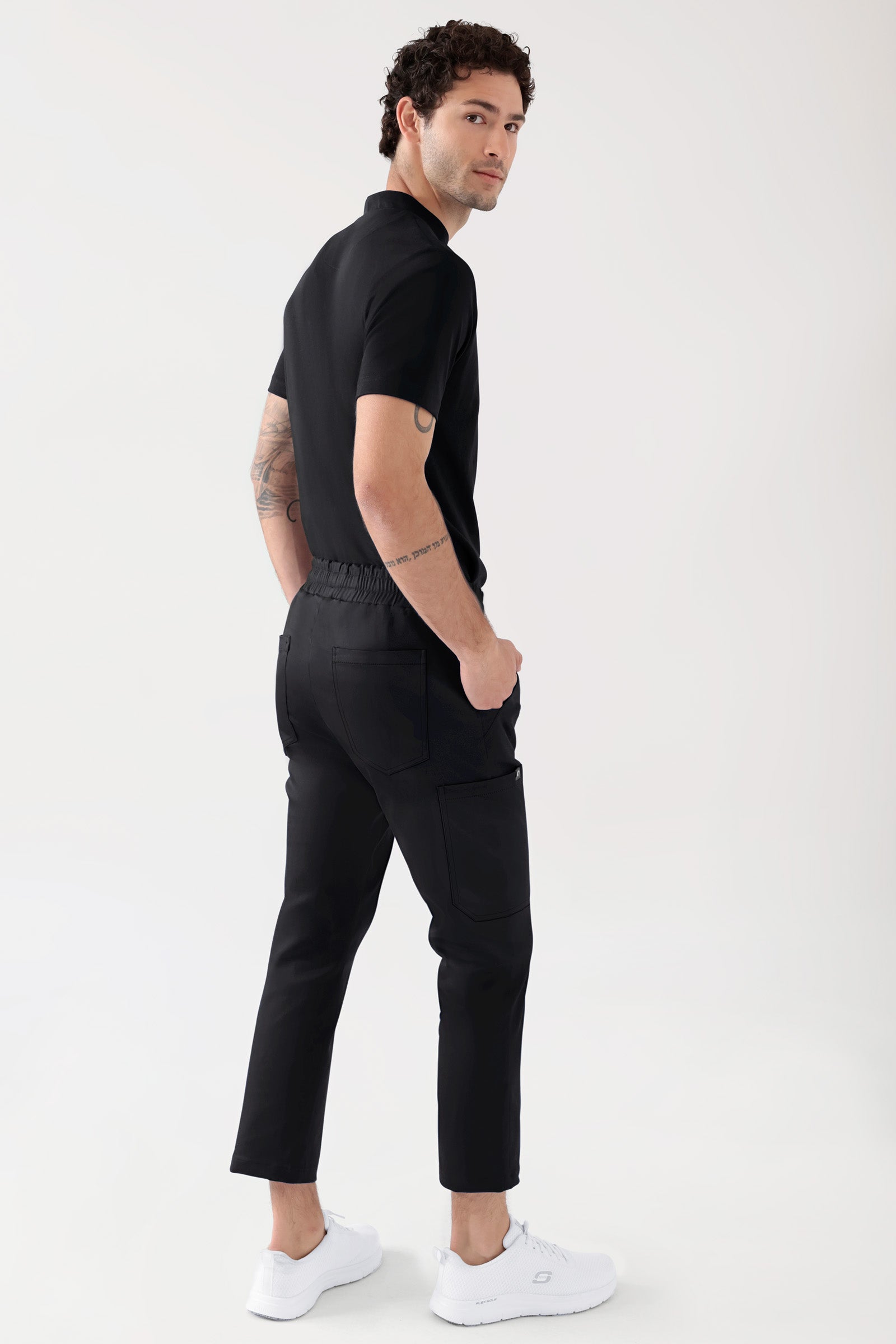 COMFY FLEX Pantalon Stretch mixte - 7/8 longueur noir, Vue de dos Le mannequin mesure 188 cm et porte la taille M
