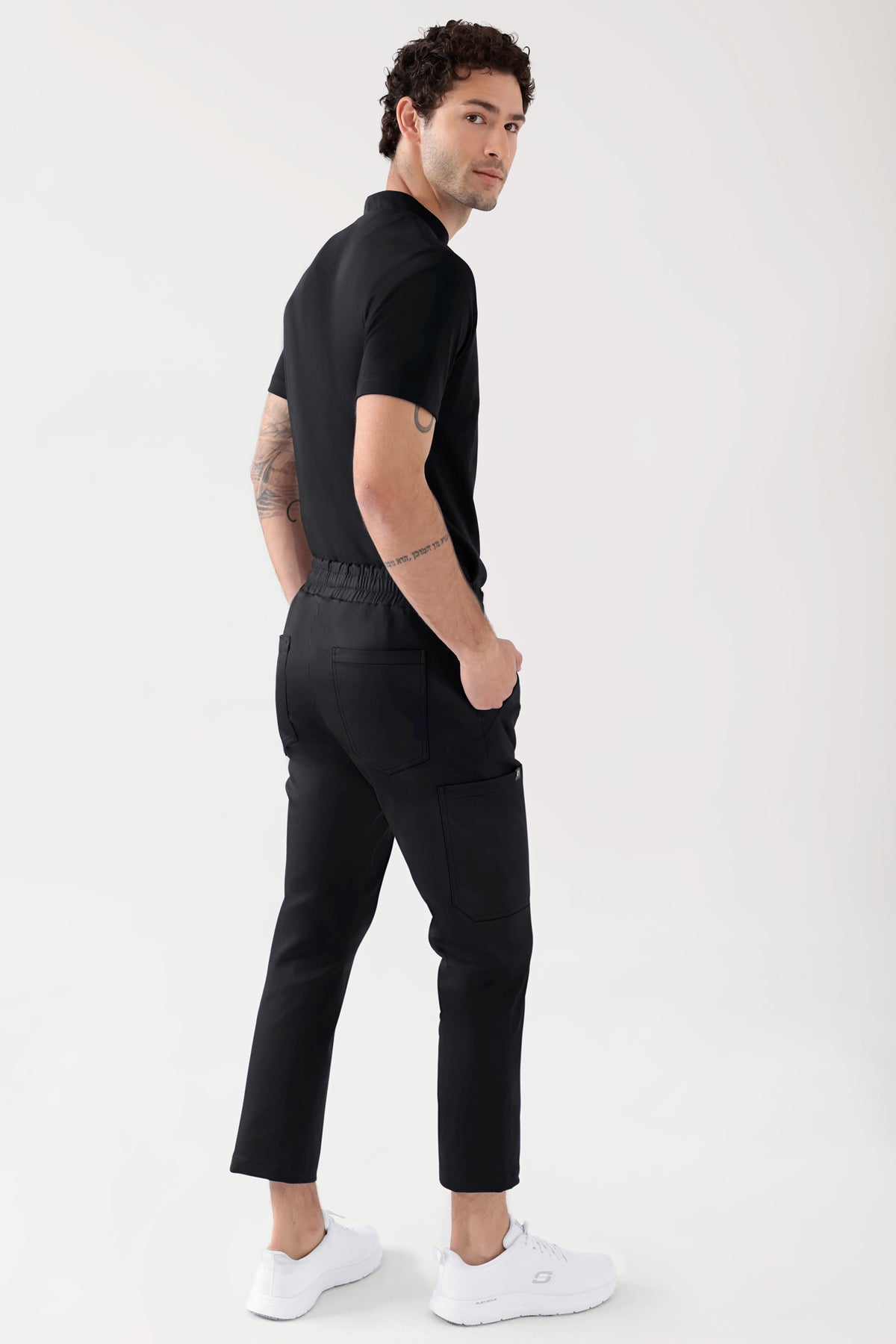 COMFY FLEX Pantalon Stretch mixte - 7/8 longueur noir, Vue de dos Le mannequin mesure 188 cm et porte la taille M
