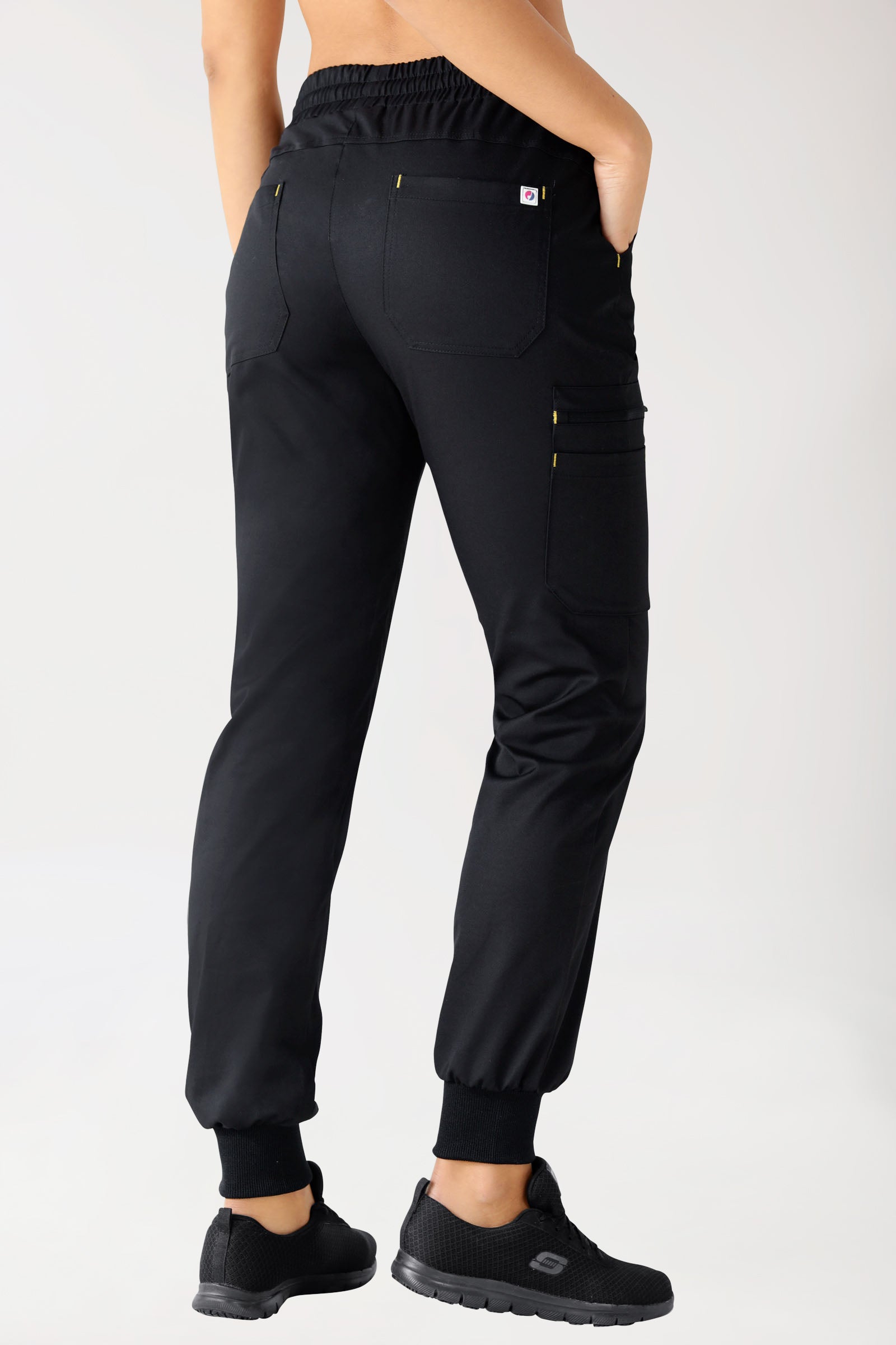 CLINIC STRETCH Pantalon Femme - Ceinture en maille noir/jaune