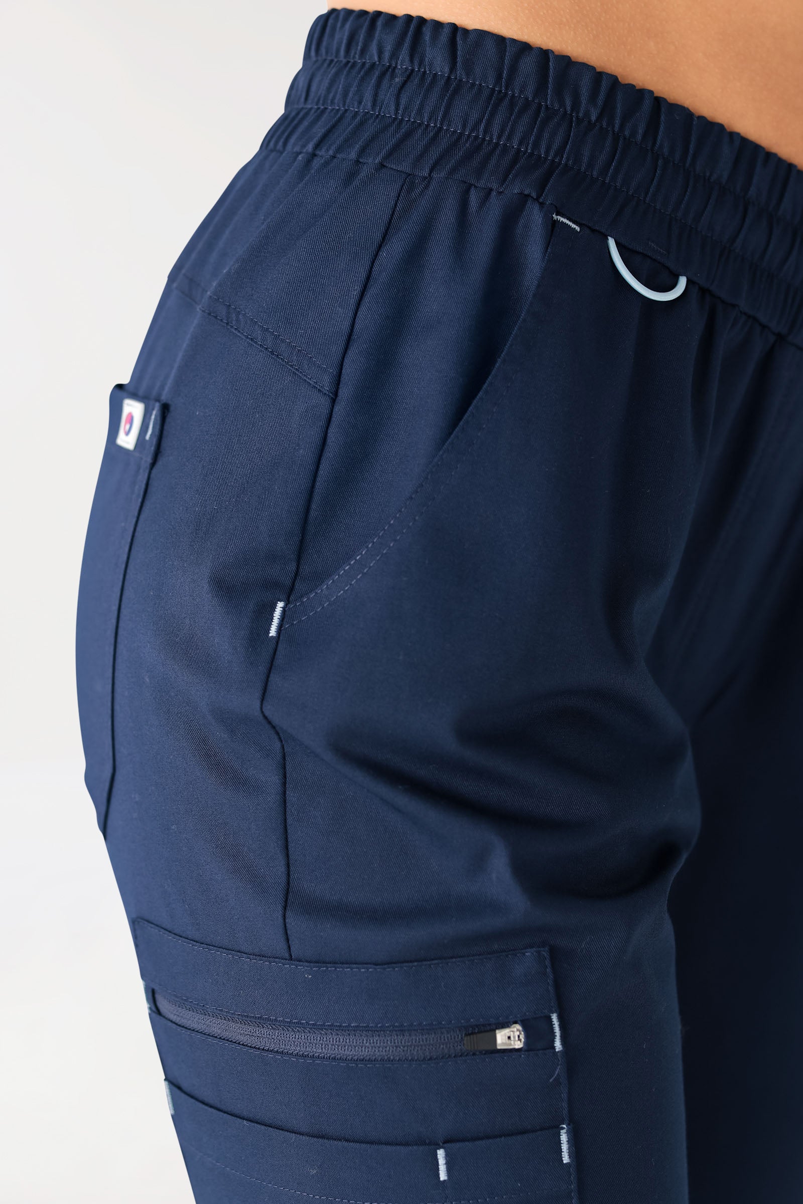 CLINIC STRETCH Pantalon Femme - Ceinture en maille bleu navy/bleu ciel