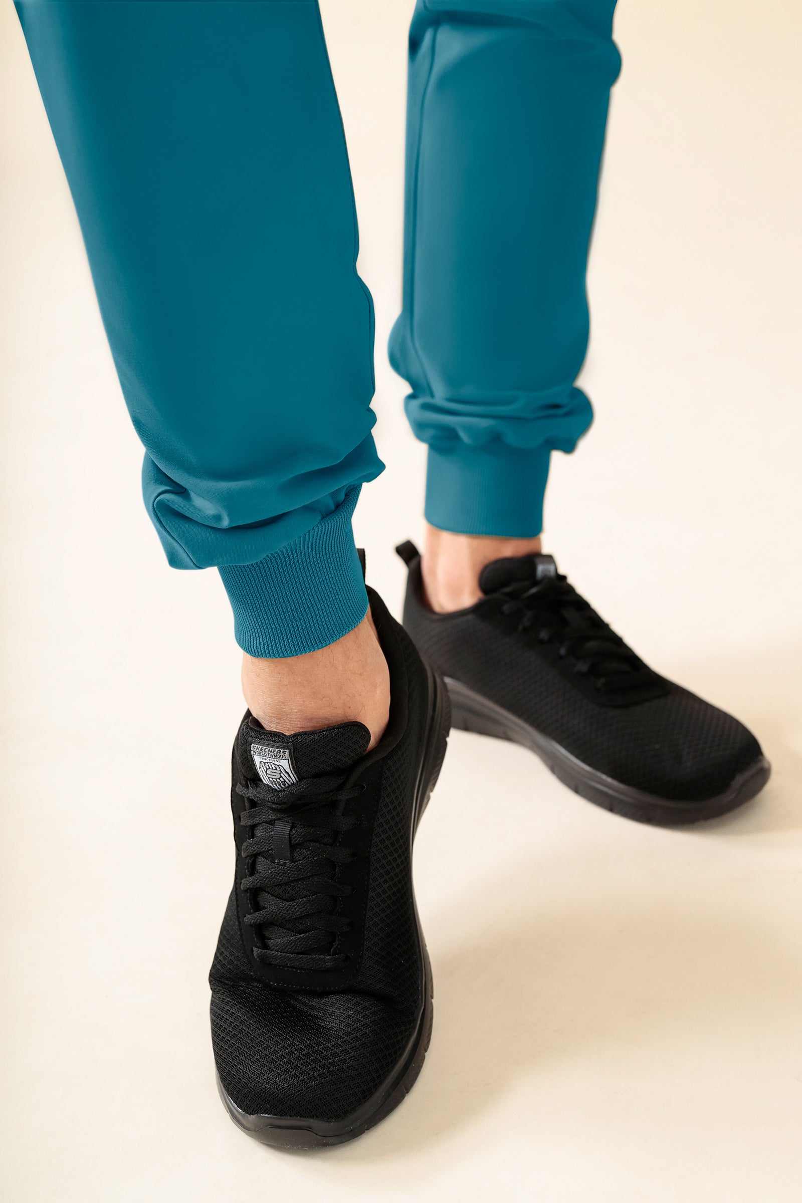 KAERE Pantalon Homme - ourlets côtelés Taille courte et sans poches cargo pétrole