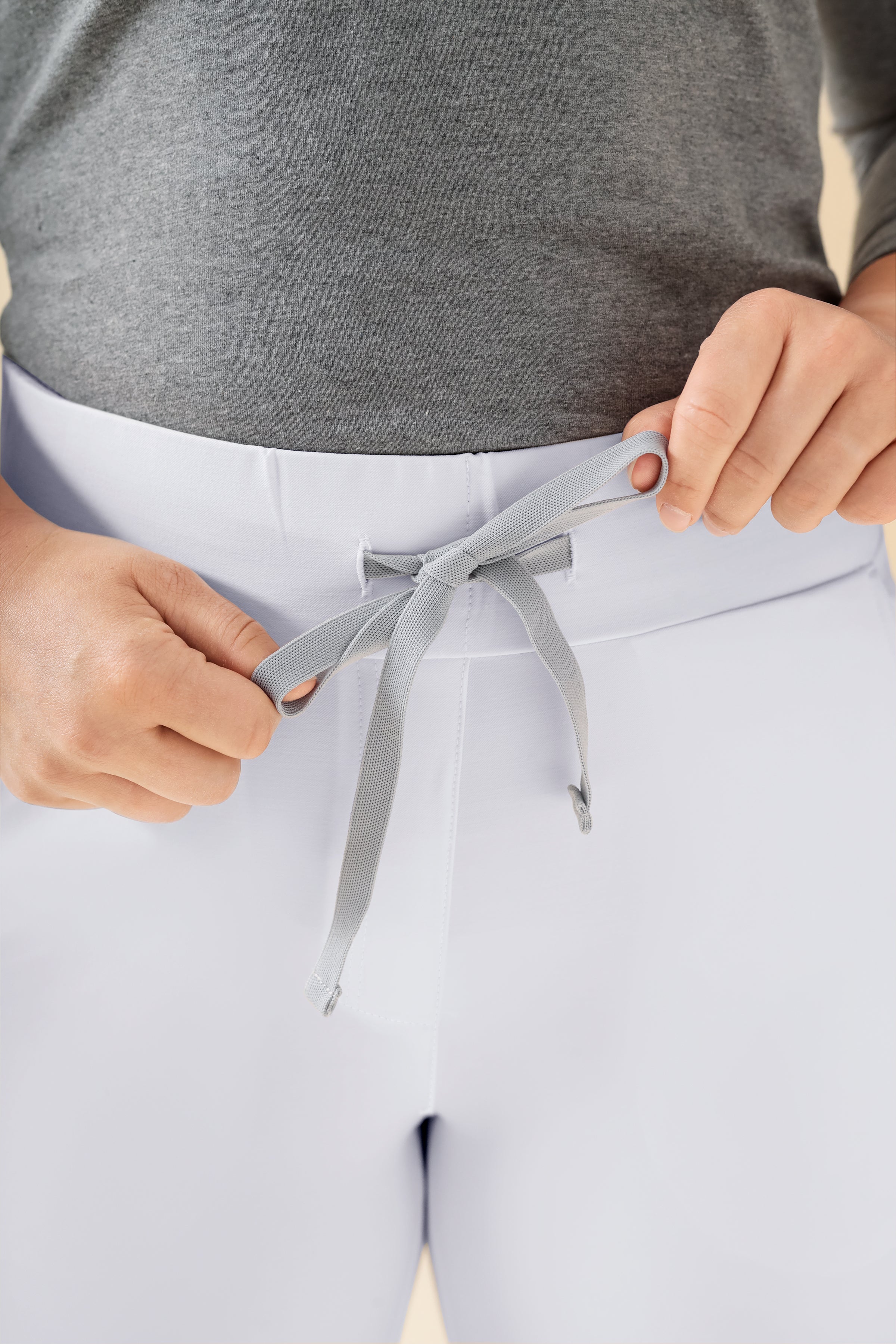 KAERE Pantalon Femme - ourlets côtelés Taille courte et sans poches cargo blanc