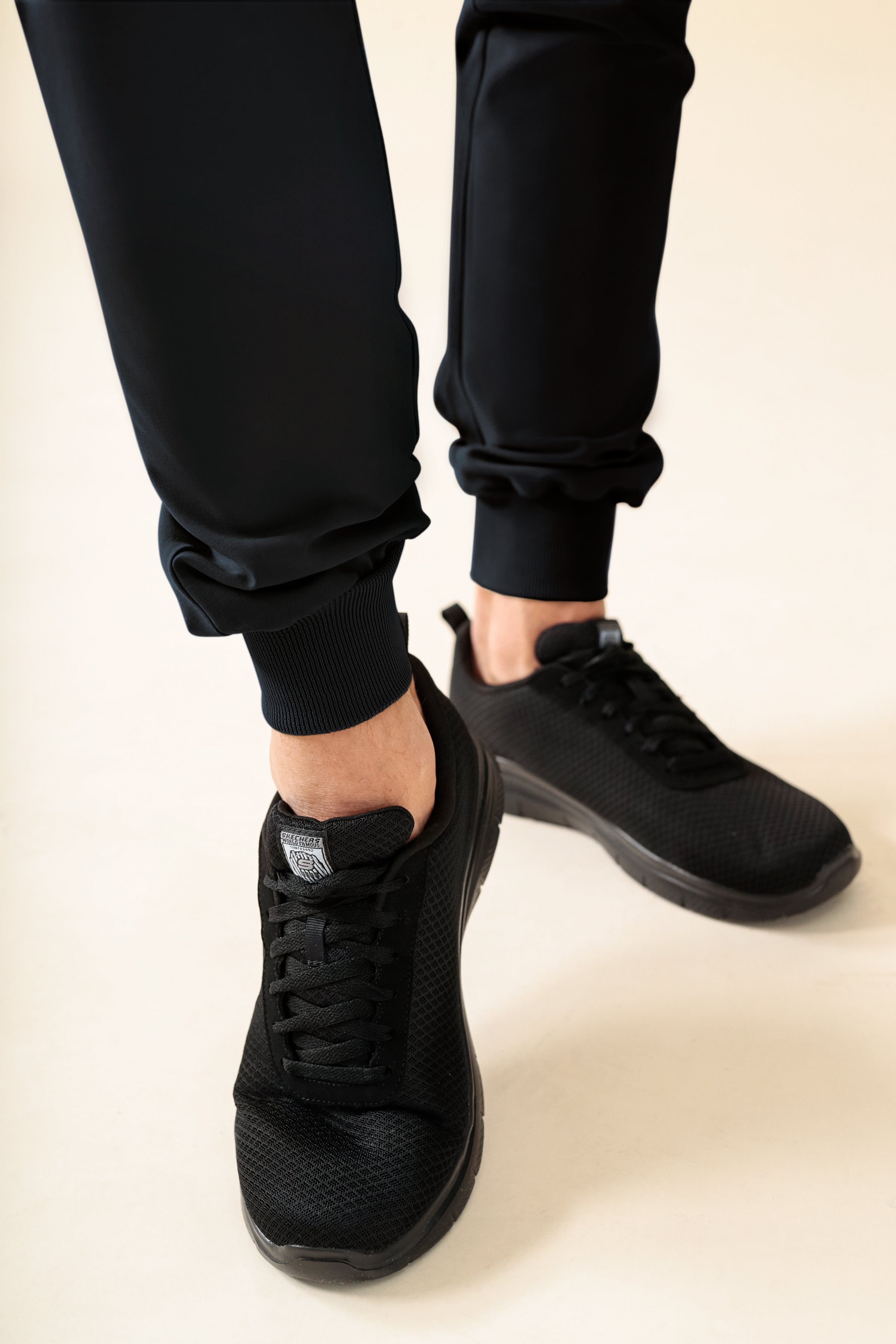 KAERE Pantalon Homme - ourlets côtelés et sans poches cargo noir