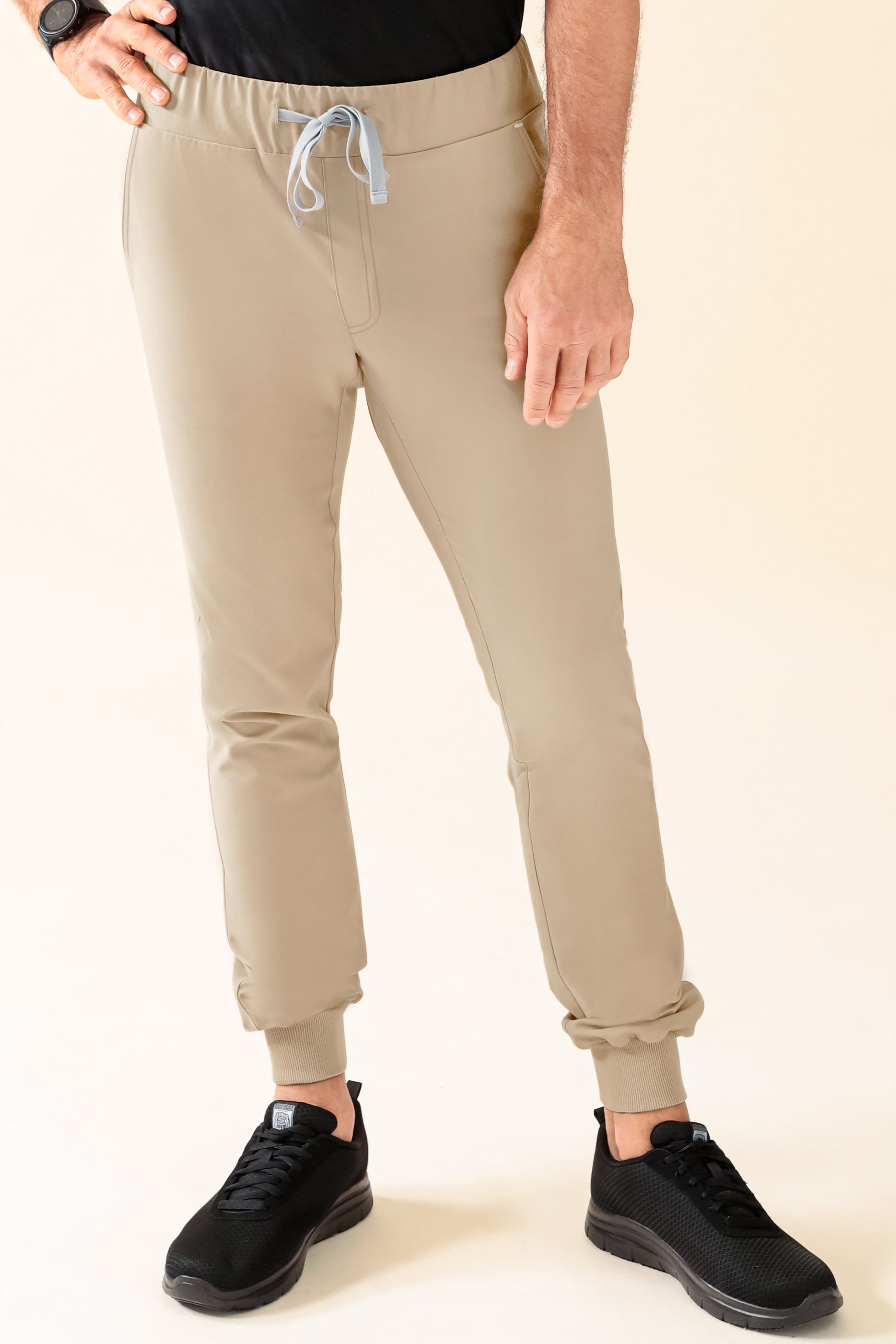 KAERE Pantalon Homme - ourlets côtelés et sans poches cargo sable