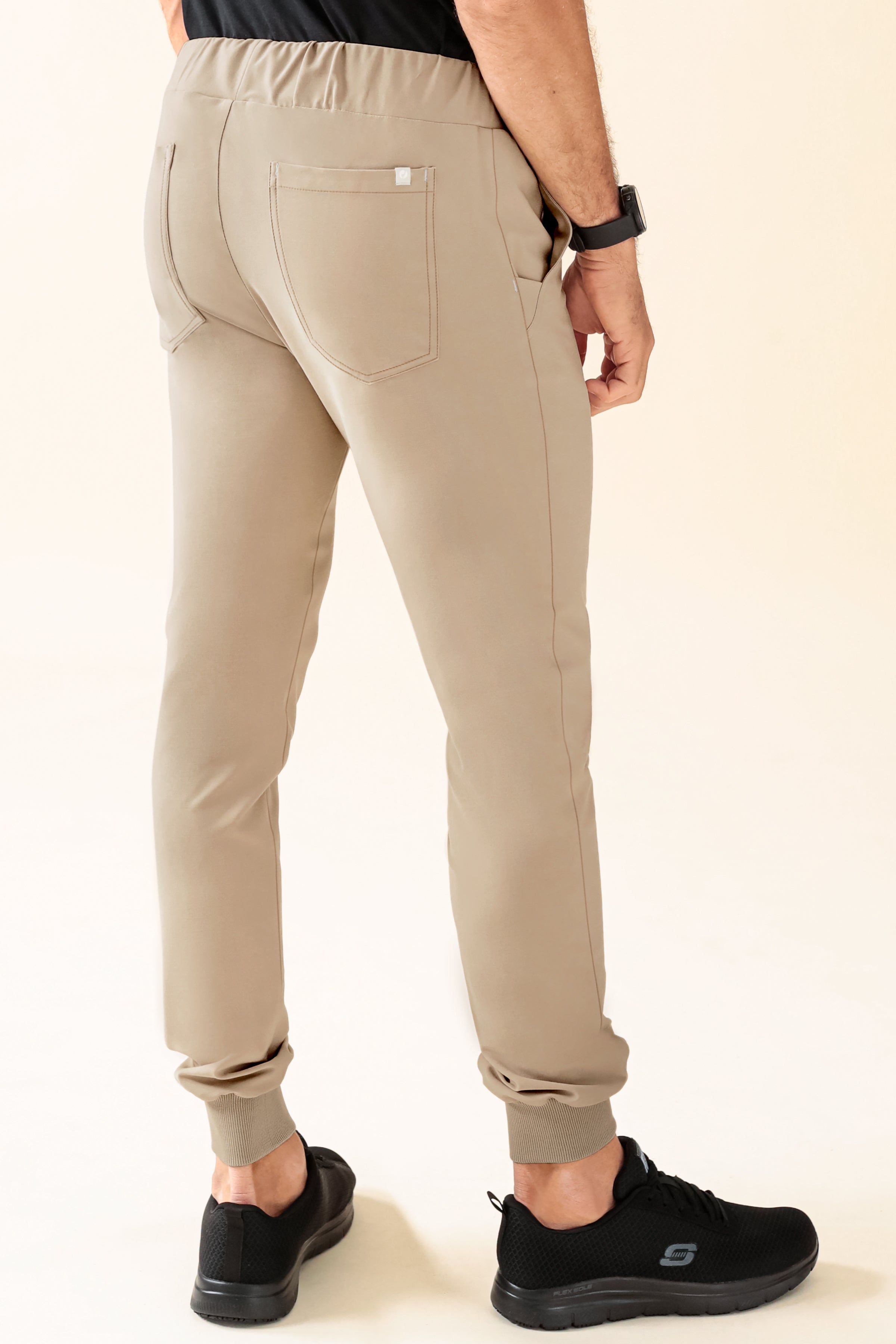 KAERE Pantalon Homme - ourlets côtelés et sans poches cargo sable
