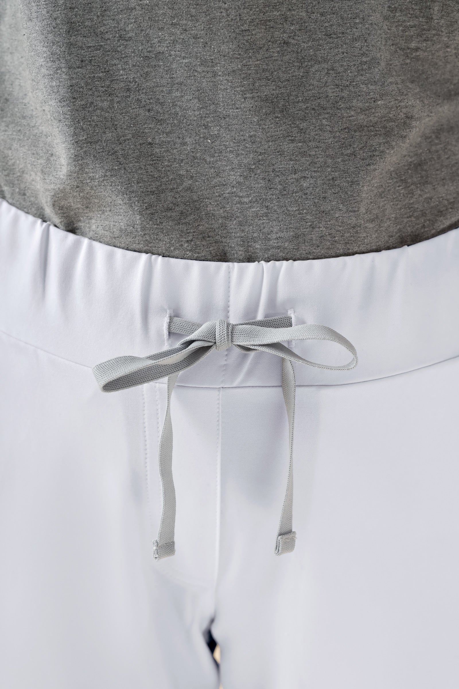 KAERE Pantalon Femme - ourlets côtelés et sans poches cargo blanc