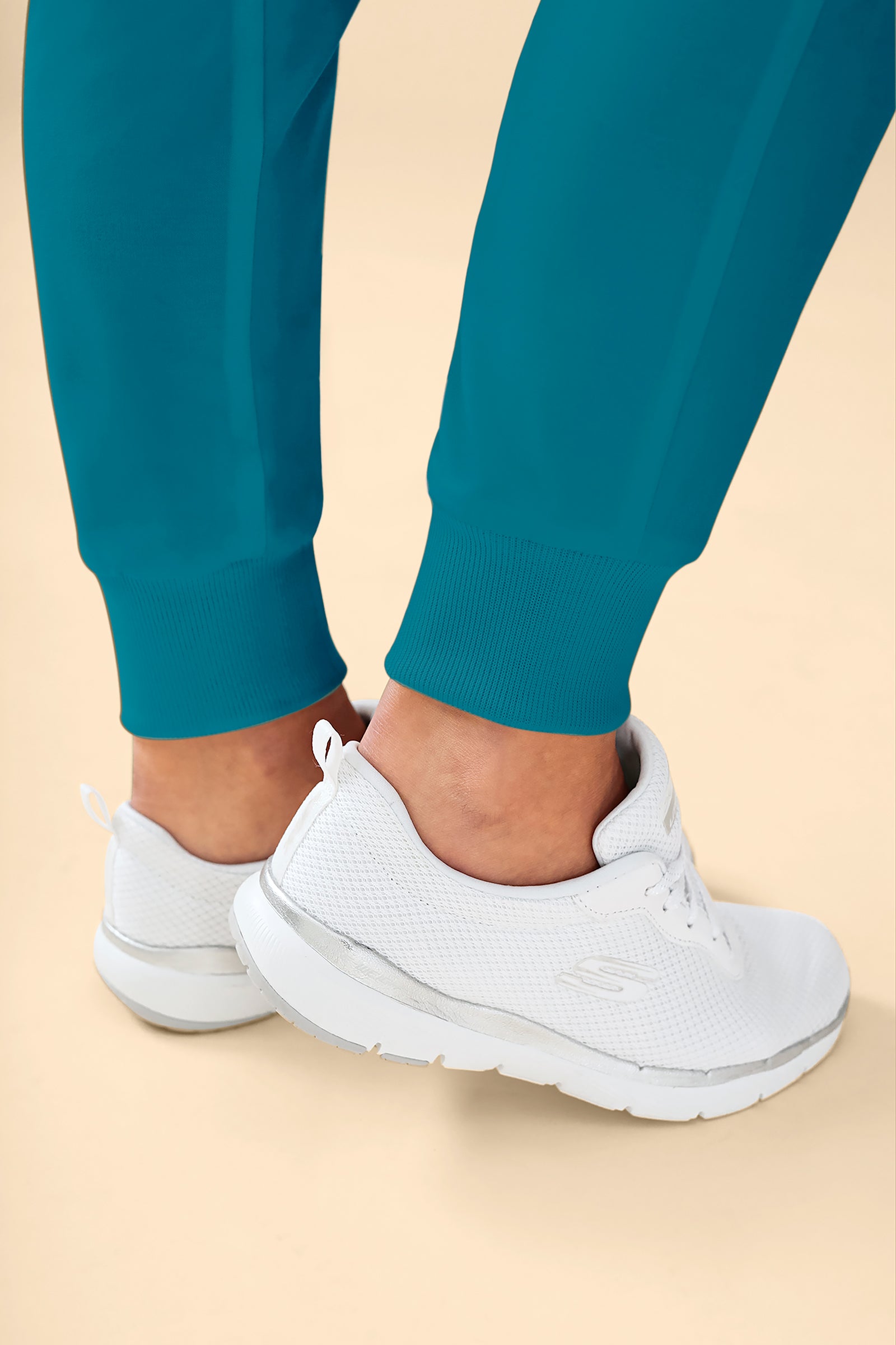 KAERE Pantalon Femme - ourlets côtelés et sans poches cargo pétrole