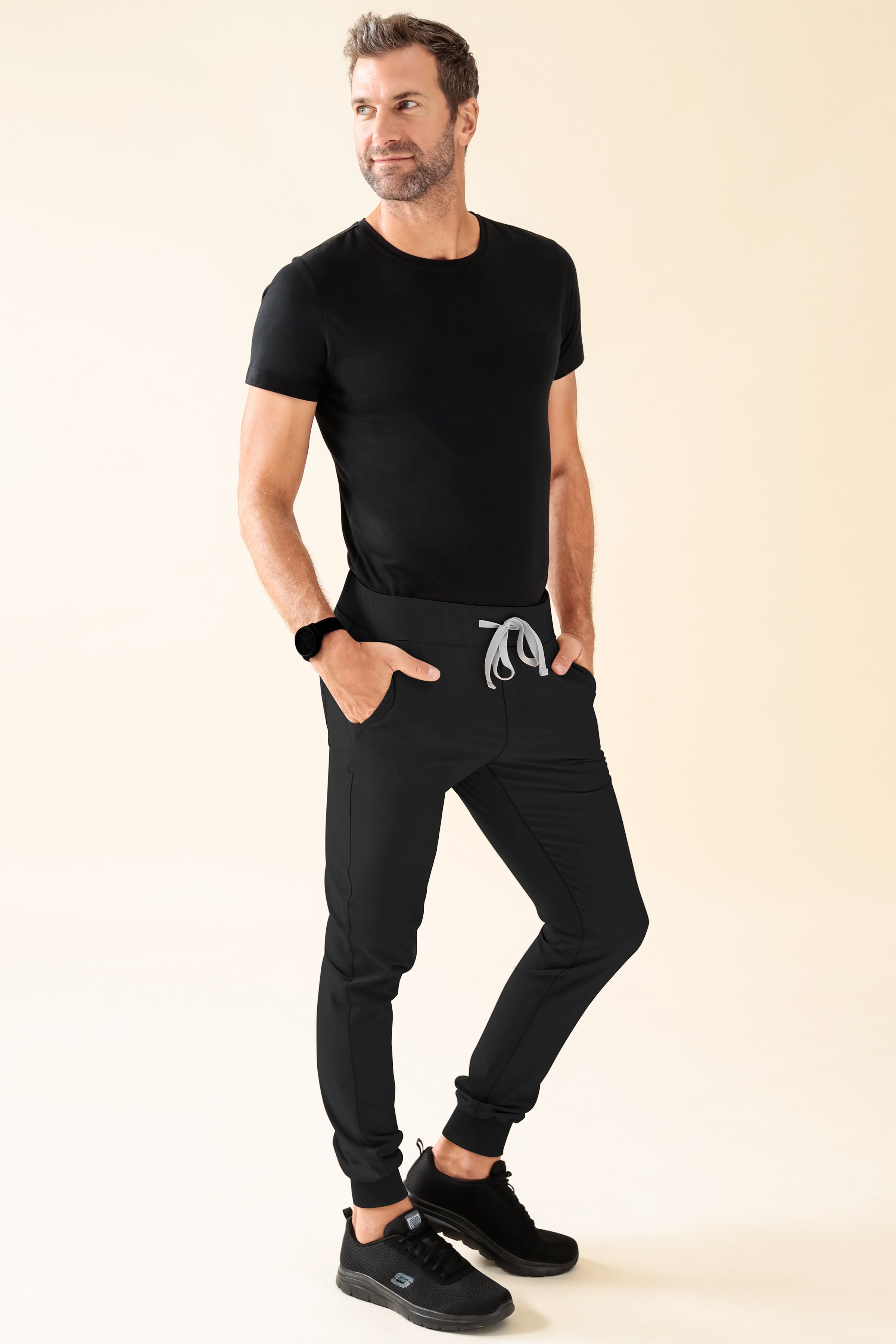 KAERE Pantalon Homme - ourlets côtelés et sans poches cargo noir, Vue de face 