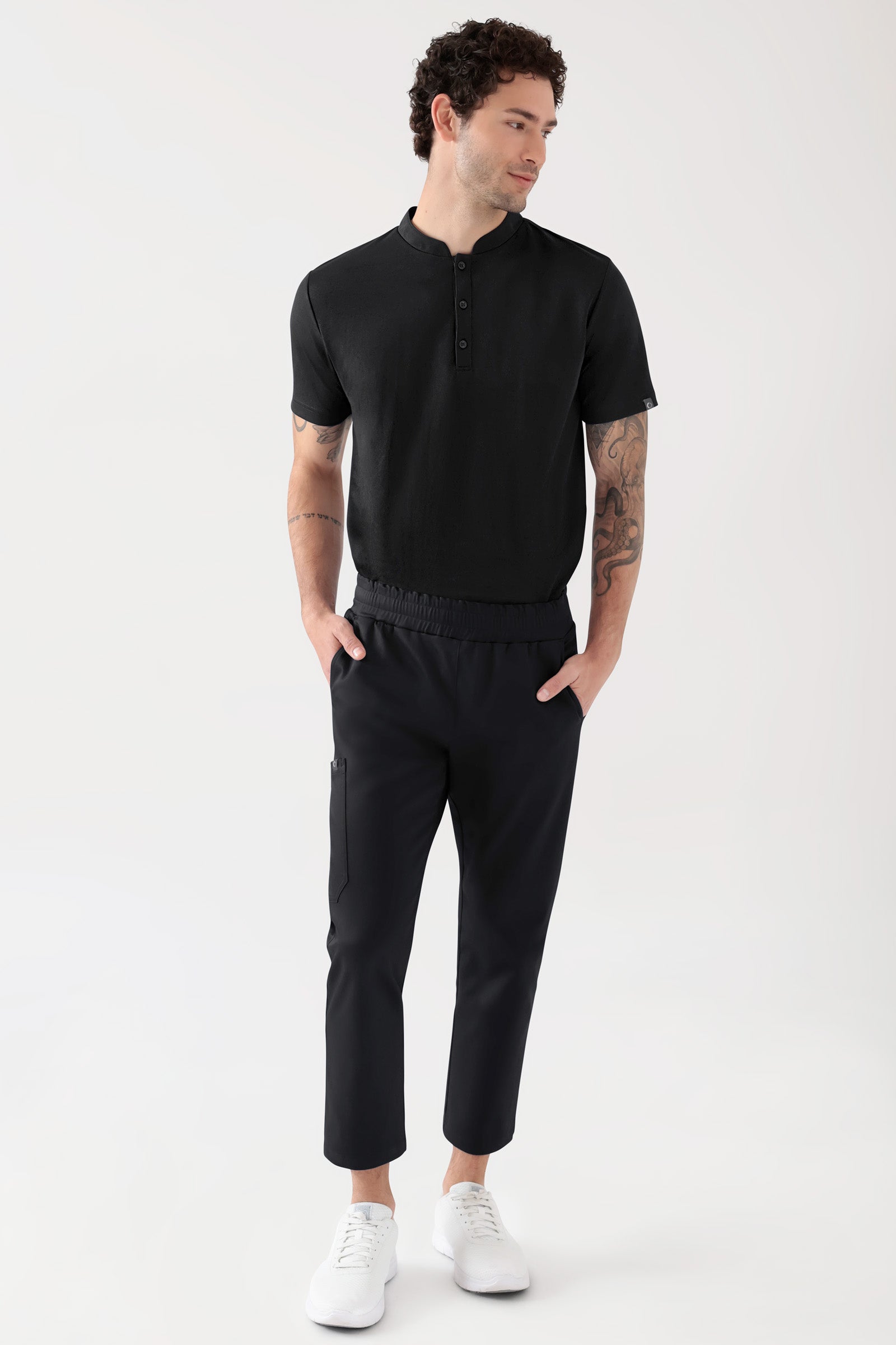 COMFY FLEX Pantalon Stretch mixte - 7/8 longueur noir, Vue de face Le mannequin mesure 188 cm et porte la taille M