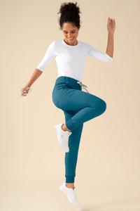 KAERE Pantalon Femme - ourlets côtelés et sans poches cargo pétrole