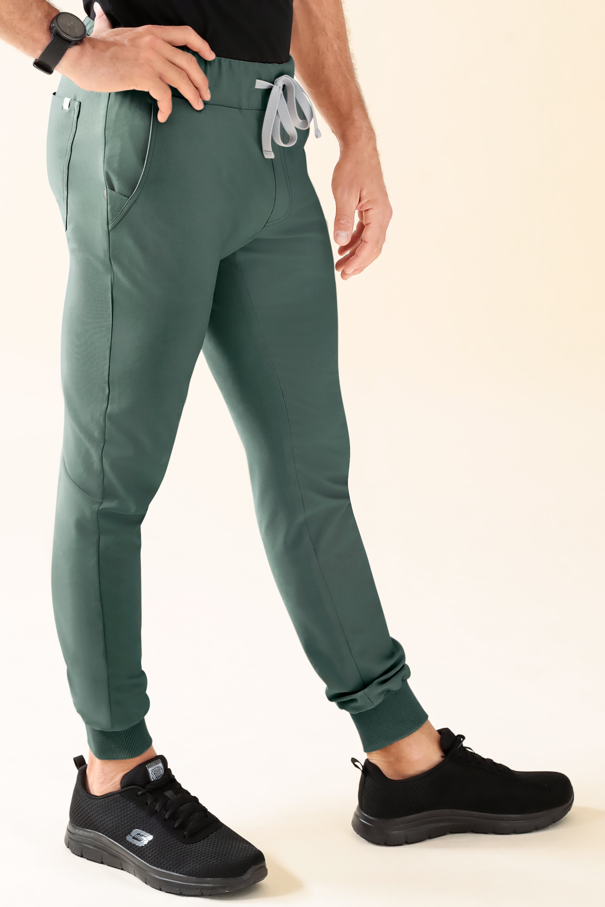 KAERE Pantalon Homme - ourlets côtelés et sans poches cargo vert foncé