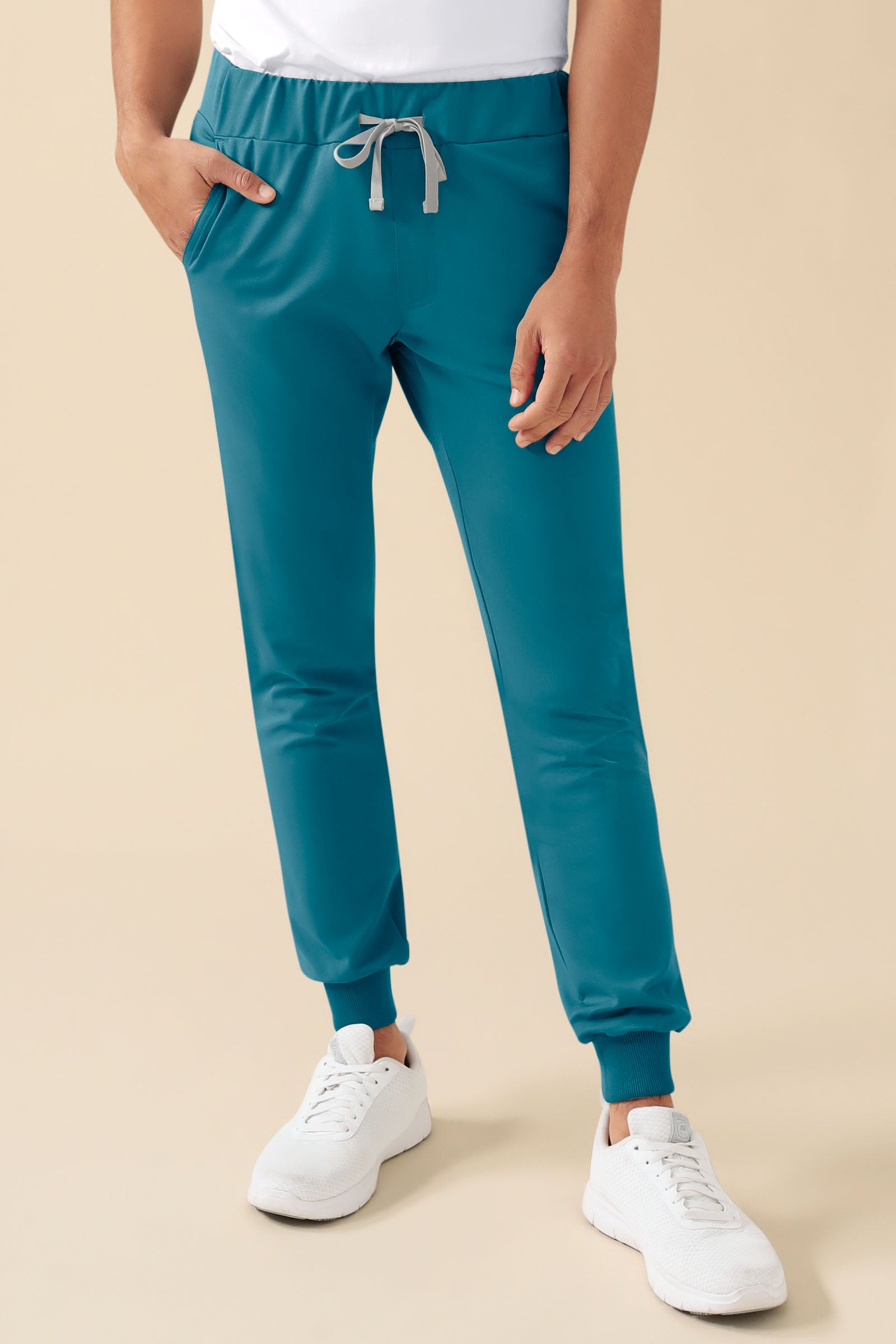 KAERE Pantalon Homme - ourlets côtelés et sans poches cargo pétrole